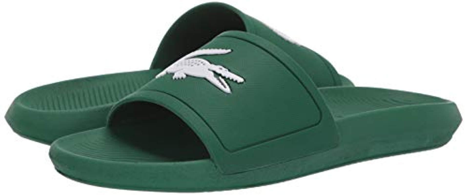 green lacoste flip flops