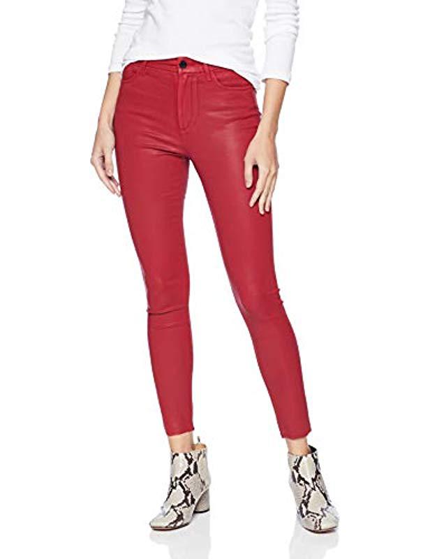 red coated skinny jeans