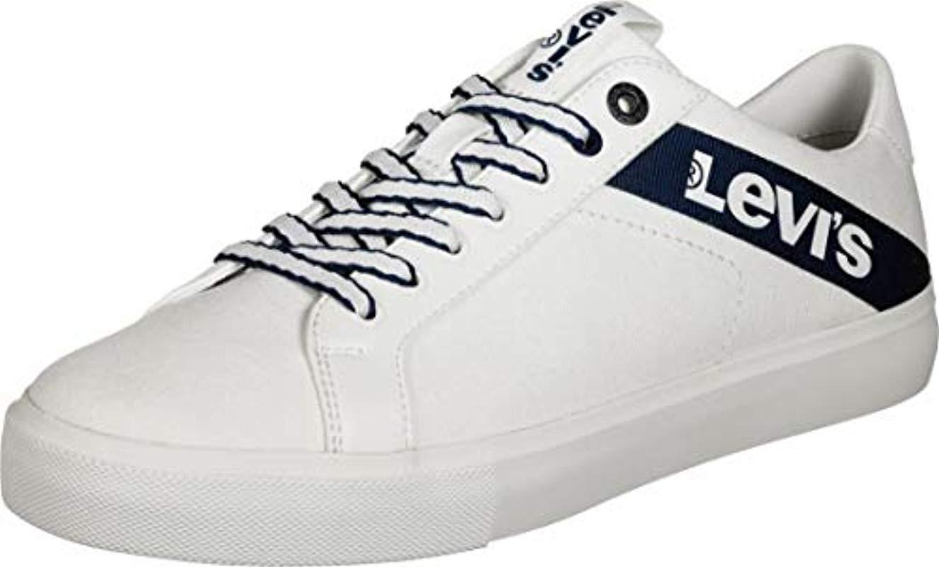 white levi trainers