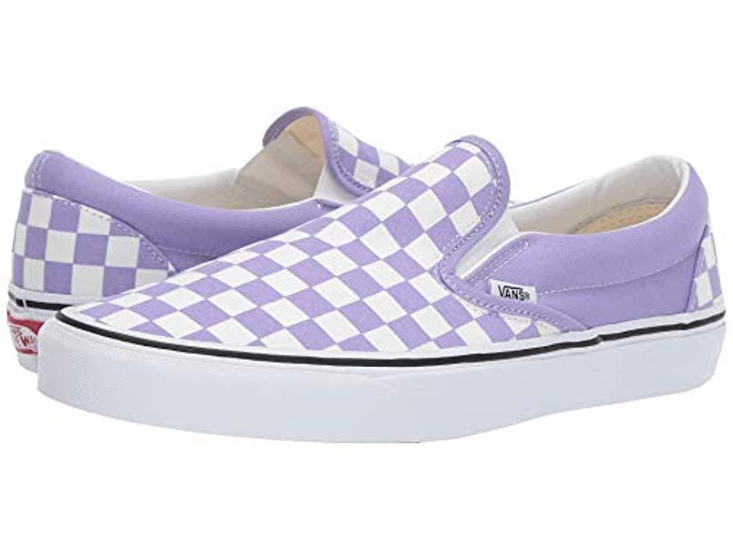 purple and white slip on vans