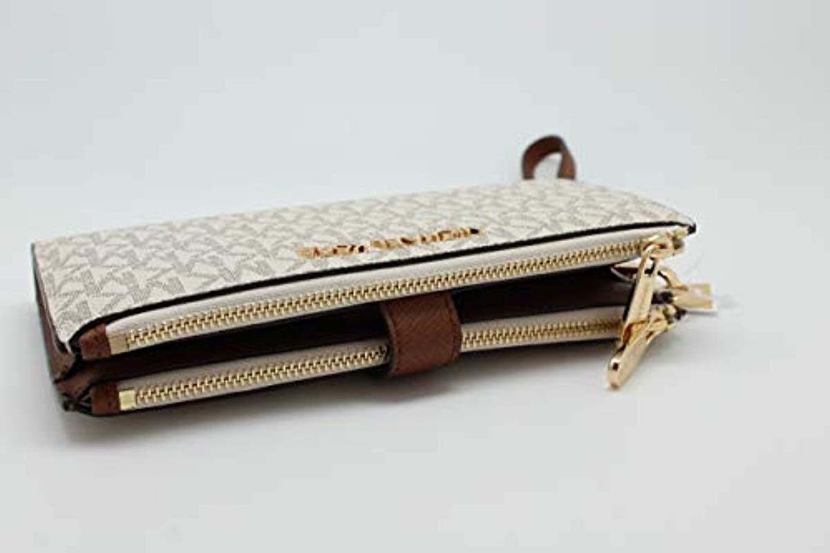 Michael kors signature jet set wristlet discount