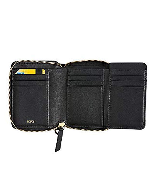 tumi tri fold zip around