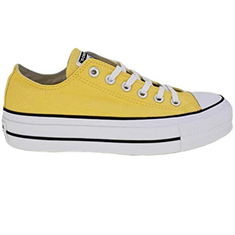 yellow all star clean lift platform trainers
