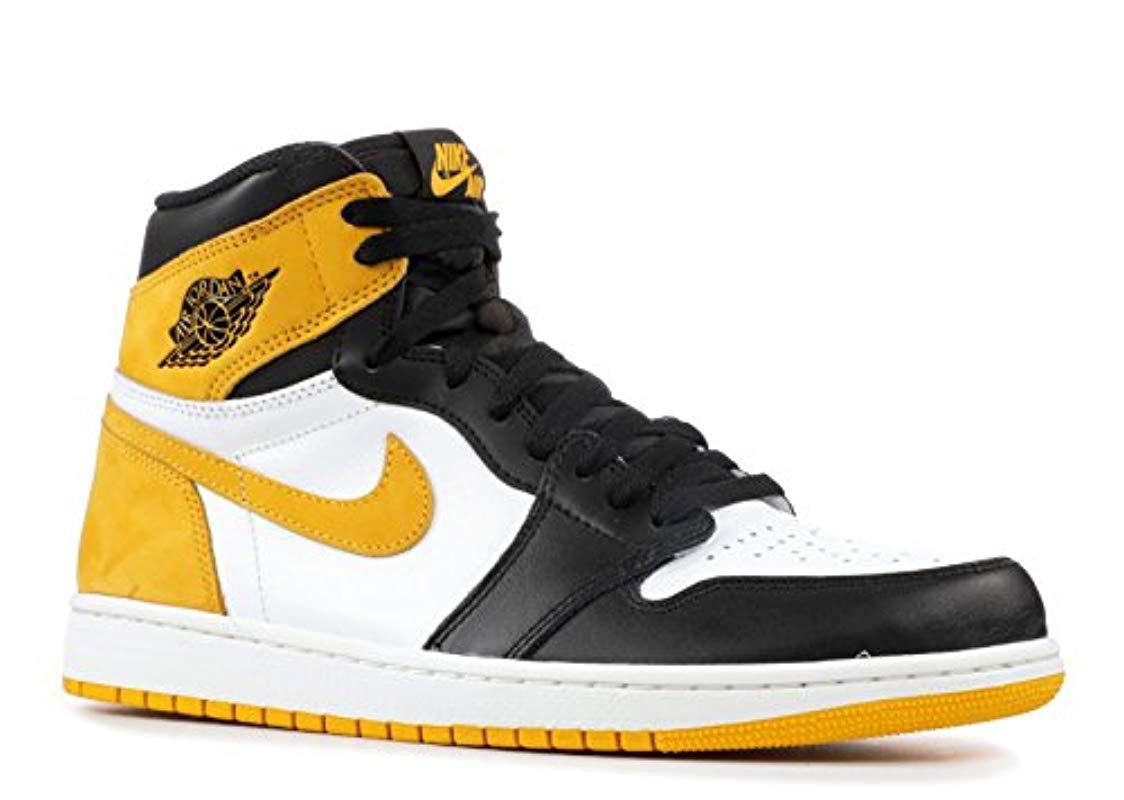 black and yellow jordans ones