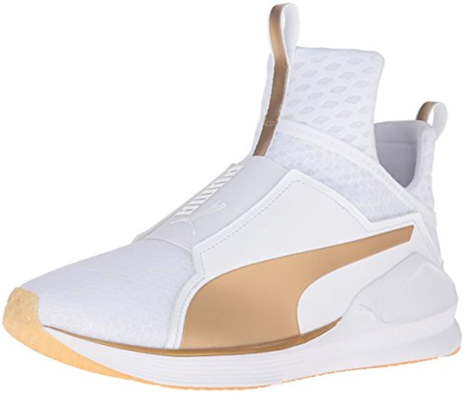 white gold and pink pumas