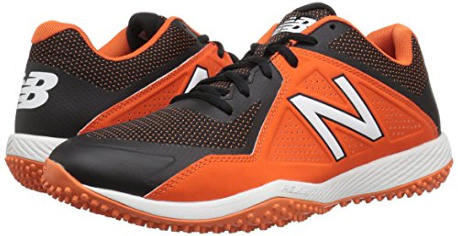 new balance orange turf shoes