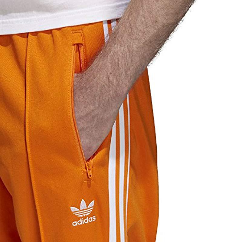 beckenbauer track pants orange