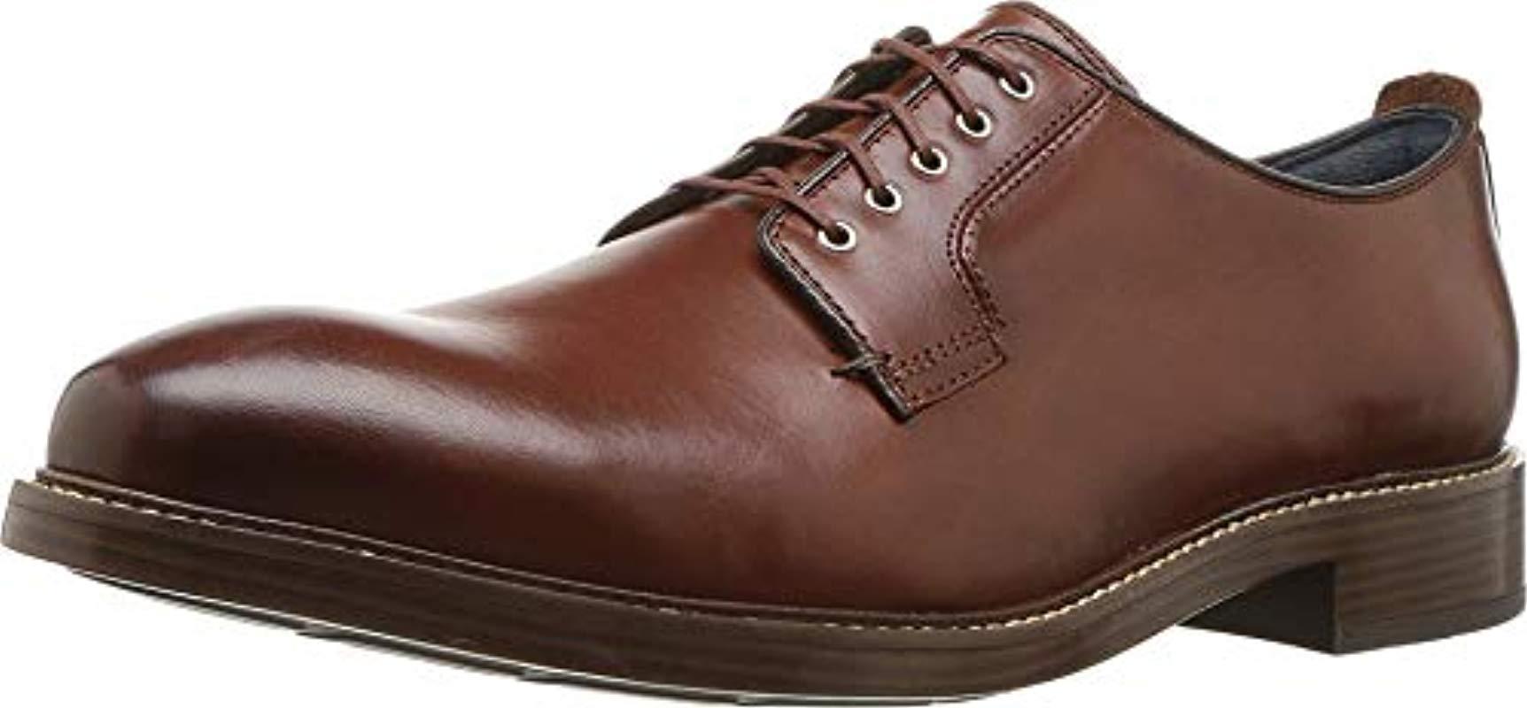 cole haan men's kennedy grand postman ii oxford