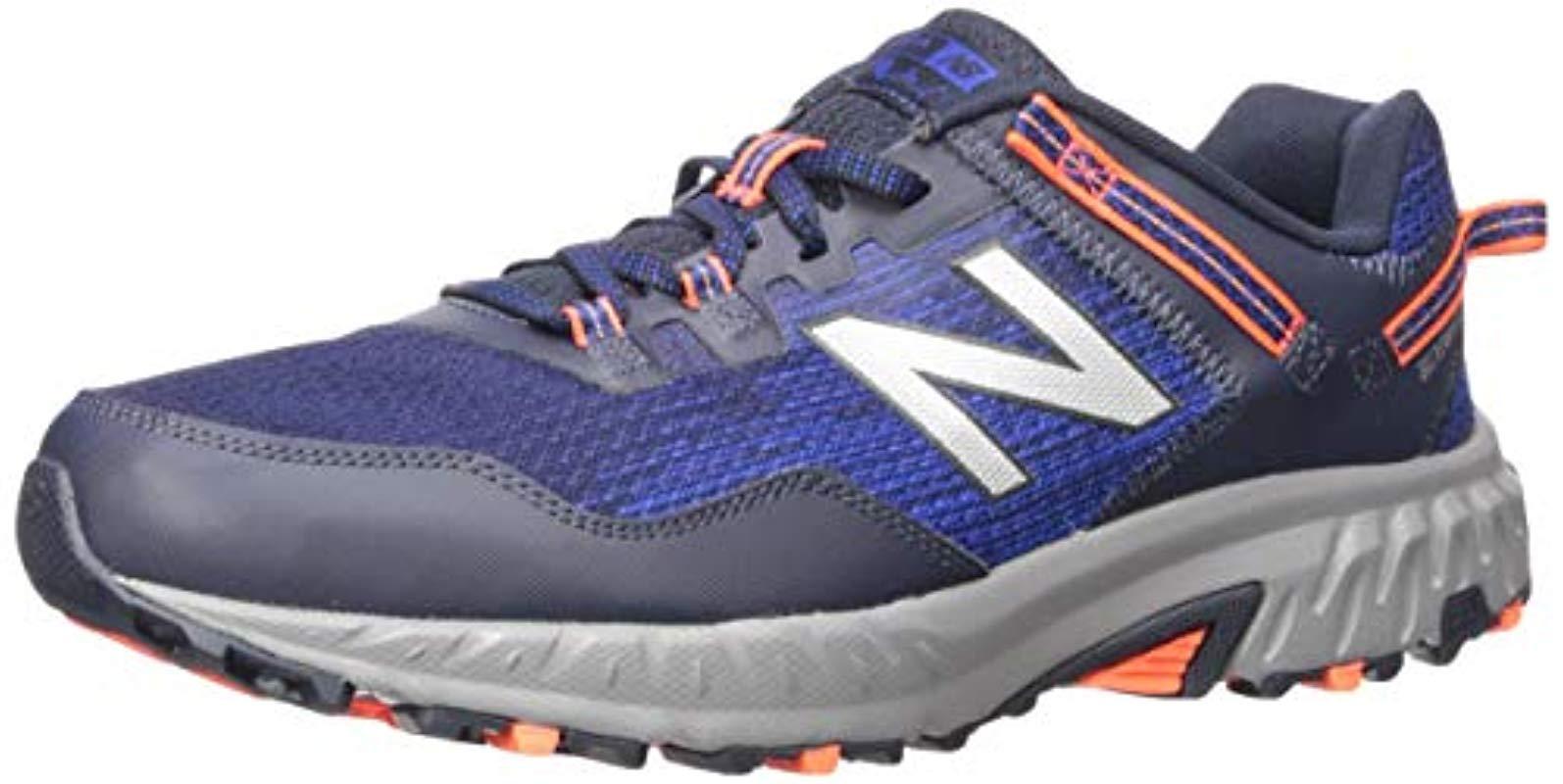 new balance 410 navy orange