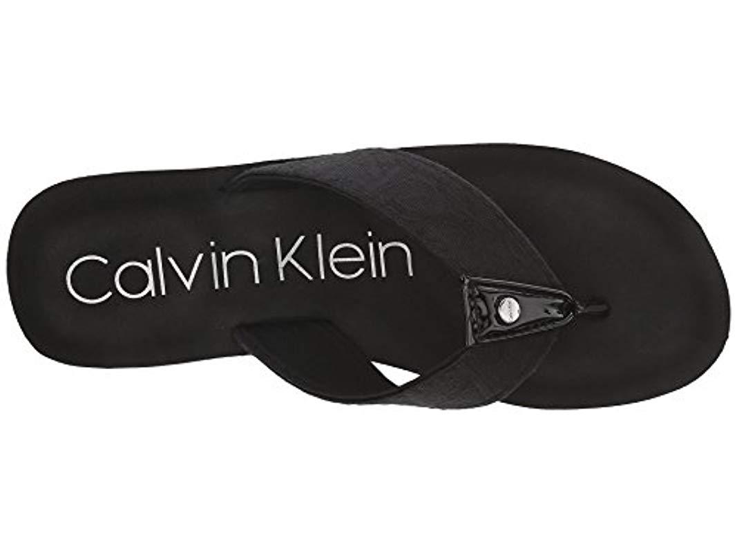 calvin klein mulan flip flops