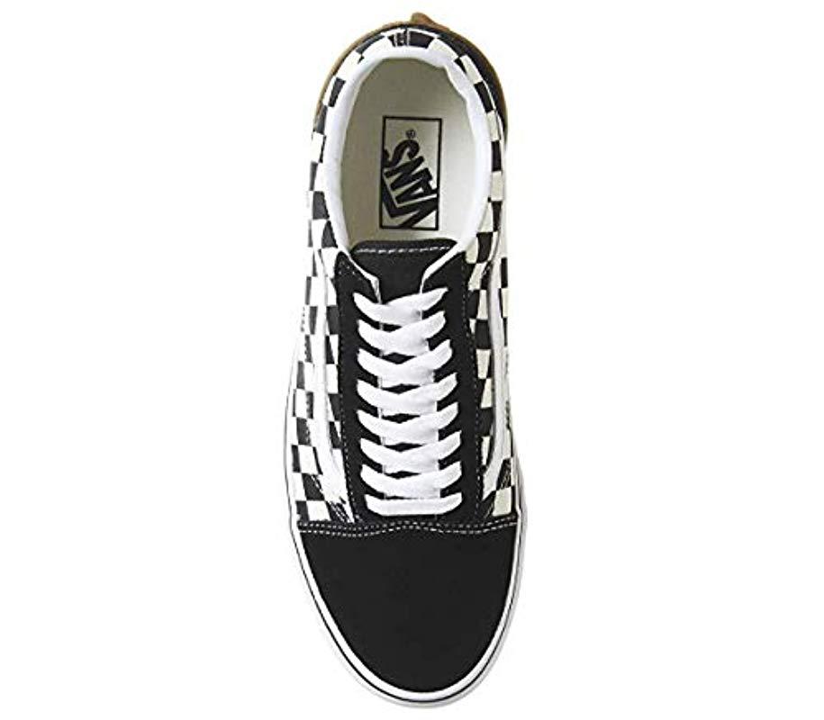 orange checkerboard slip on vans