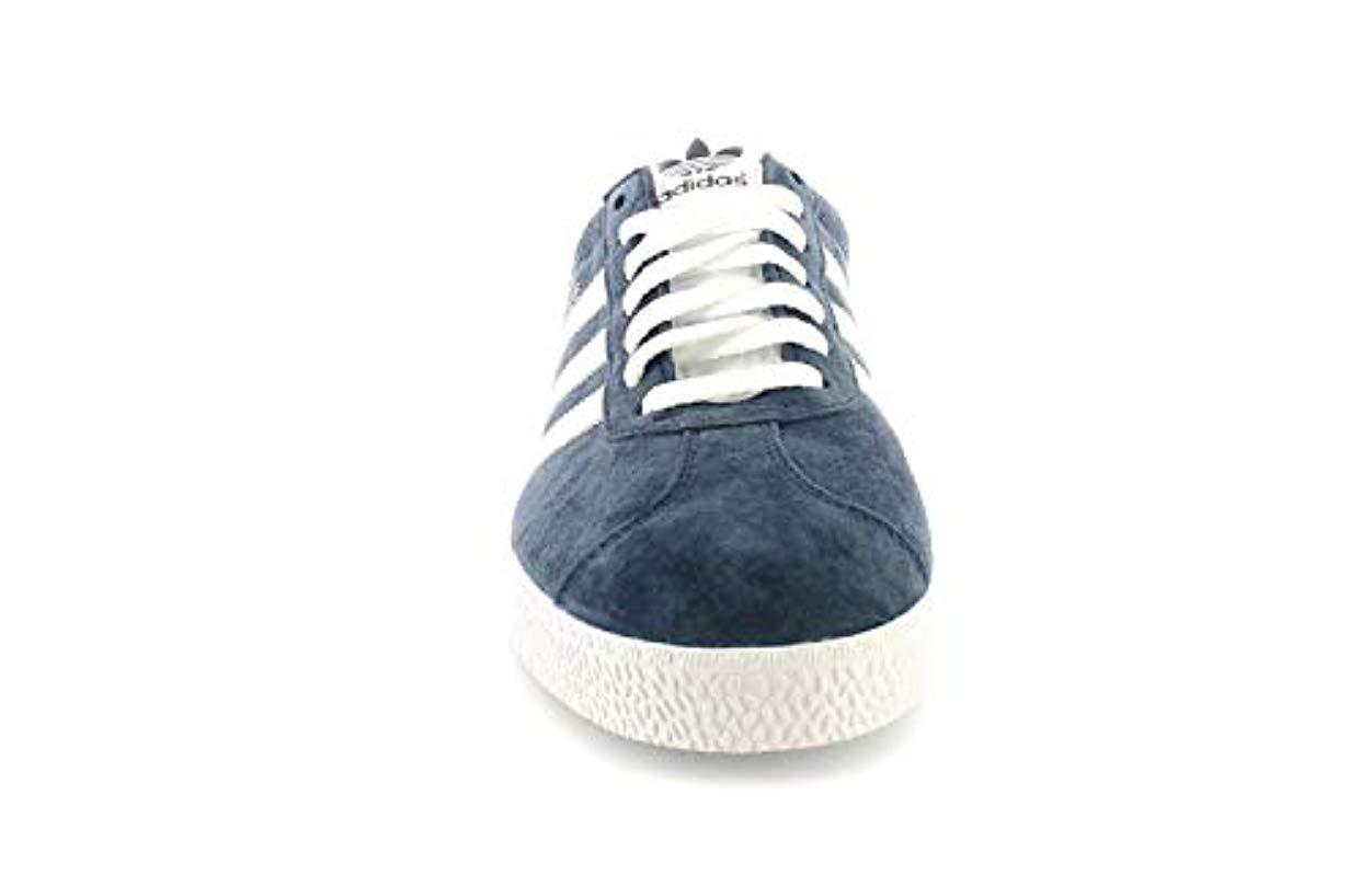 mens white gazelles