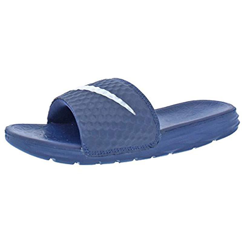dark blue nike slides