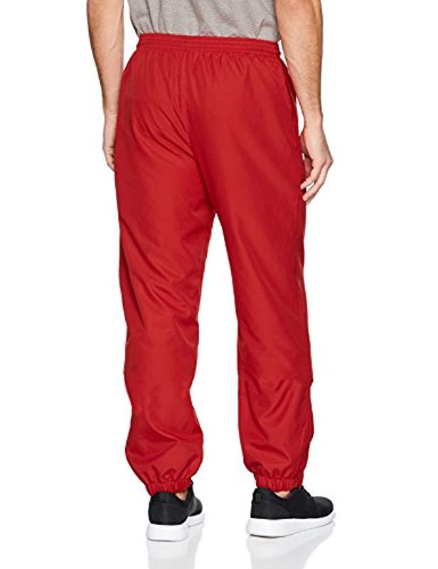 red lacoste trousers