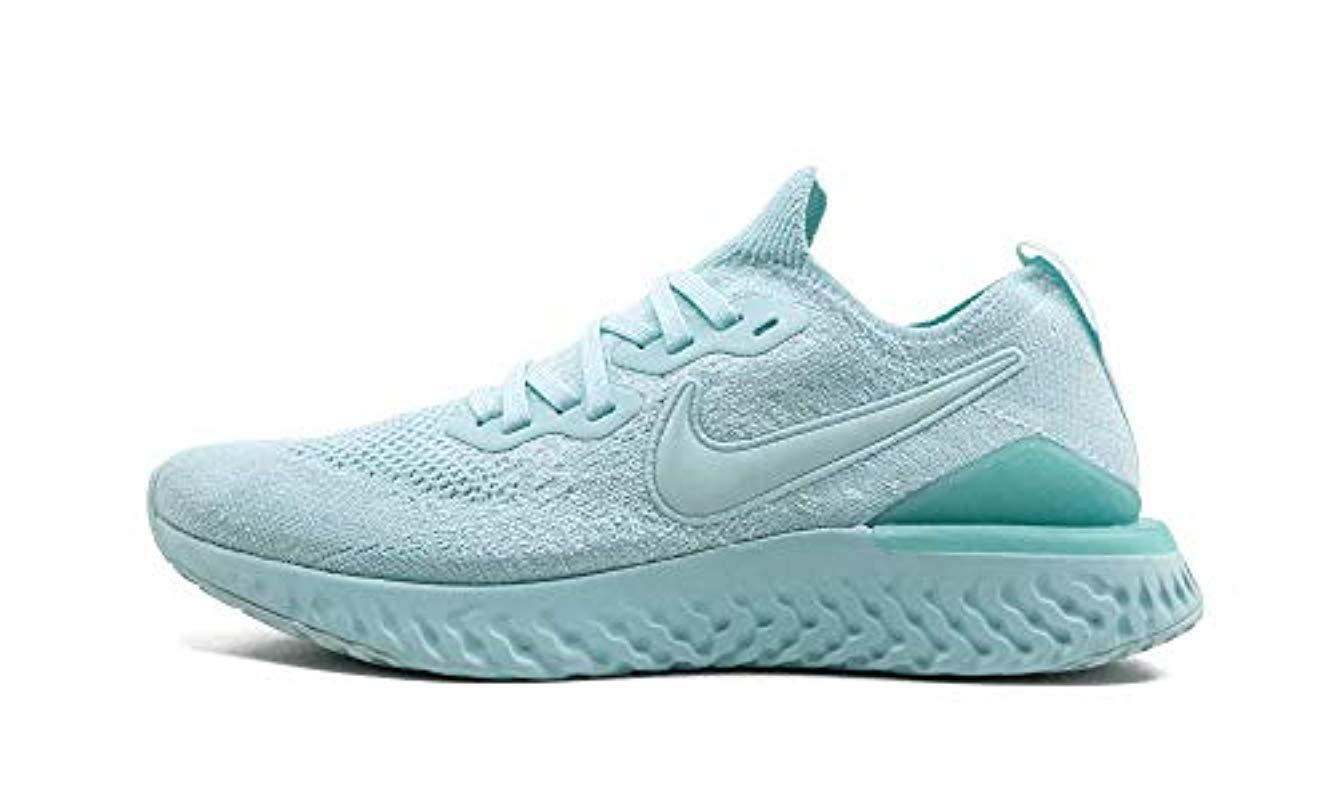 teal nike running shoes