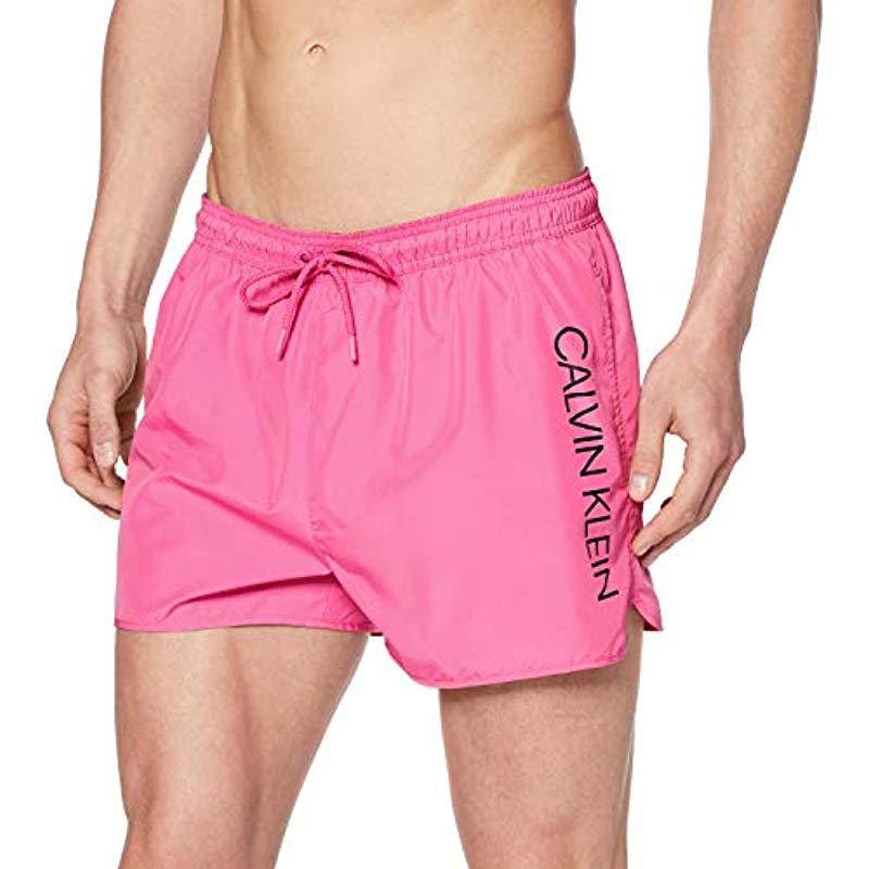 Шорты calvin klein. Шорты Кельвин Кляйн. Calvin Klein Swim shorts Red. Плавательные шорты Calvin Klein. Calvin Klein Swimwear мужские шорты.