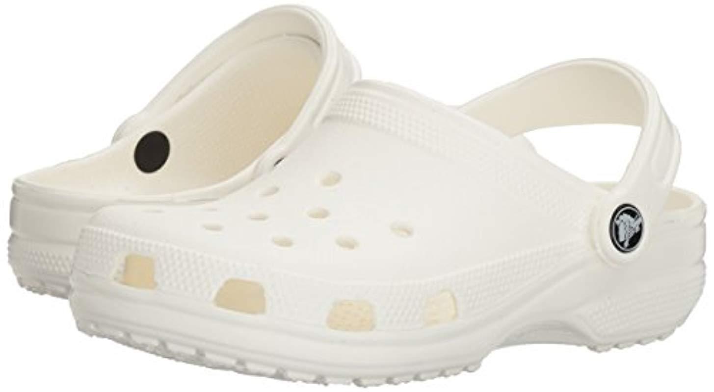 sage green crocs
