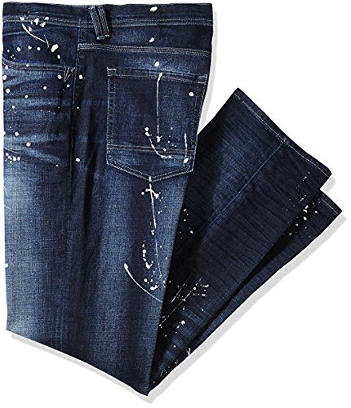 blue jeans with white paint splatter