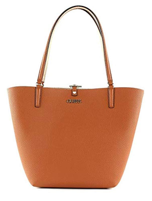 Donna Borsa Shopping Reversibile Alby Cognac/Rose MOD. HWVG74 55230 di Guess  in Marrone | Lyst