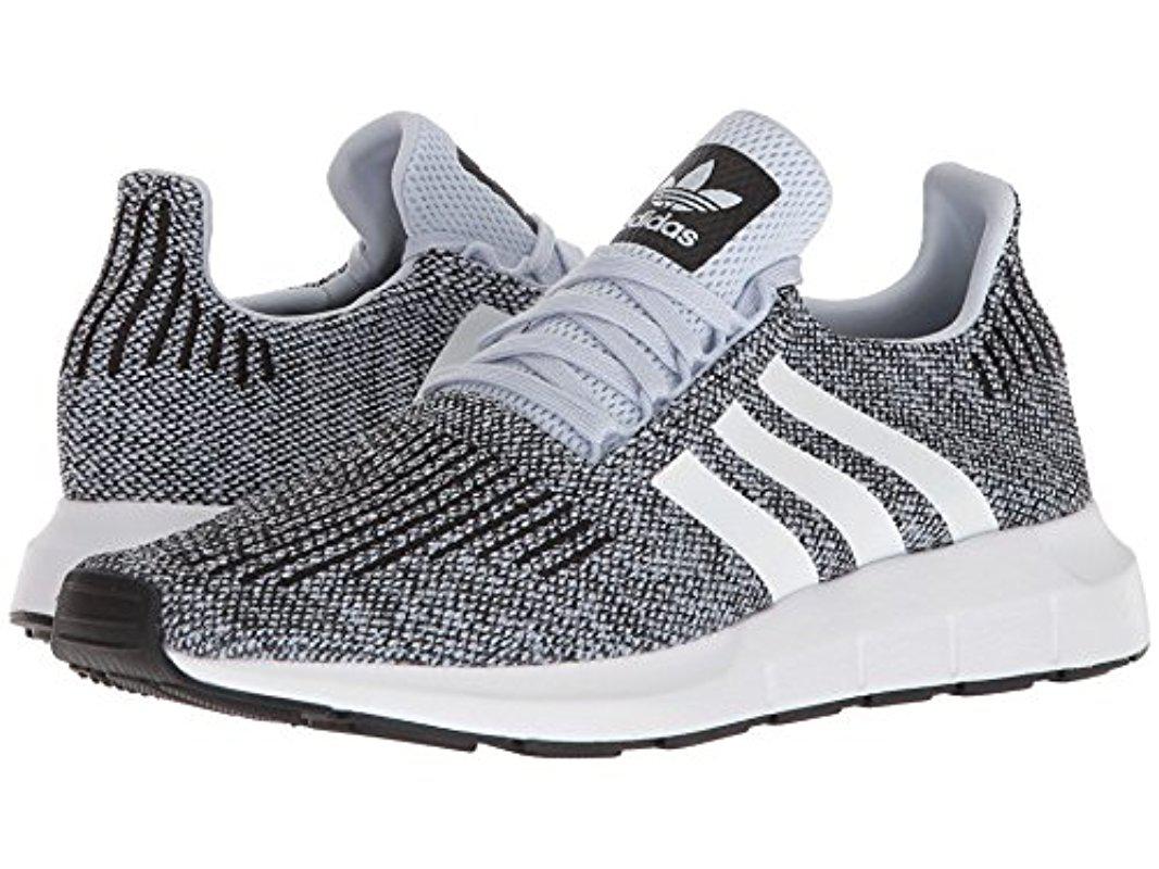 blue adidas swift run