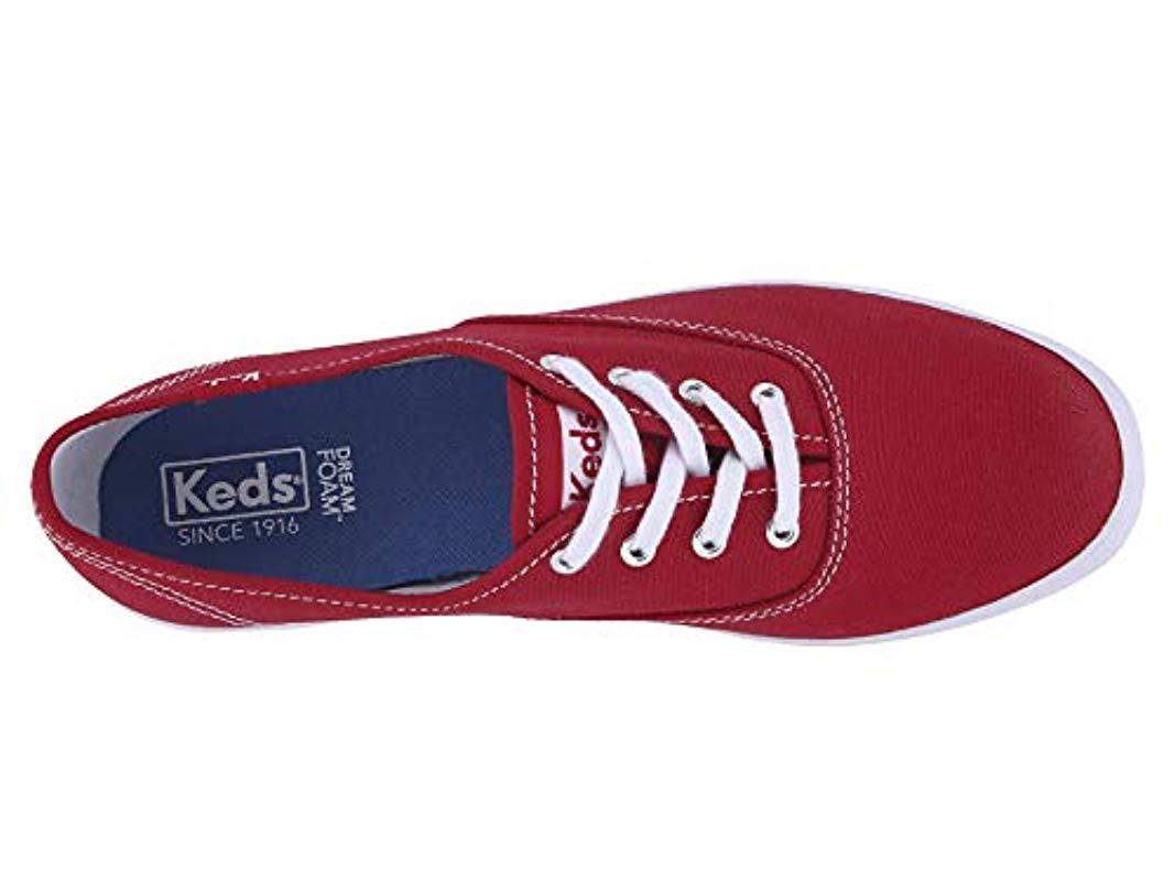 red leather keds