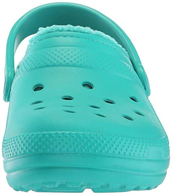 teal lined crocs