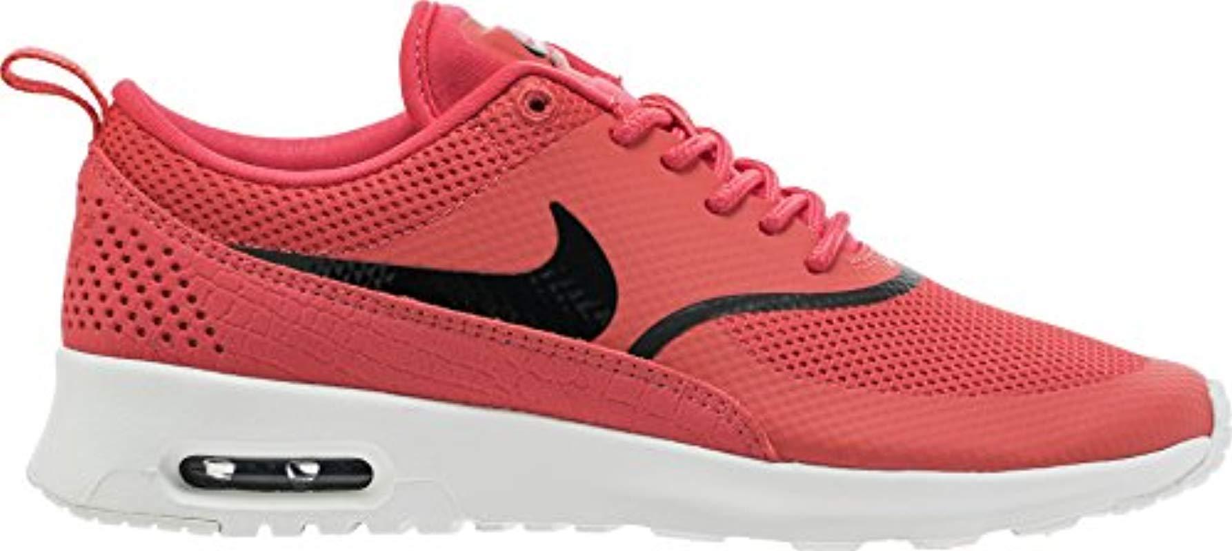 nike red colour sports shoes