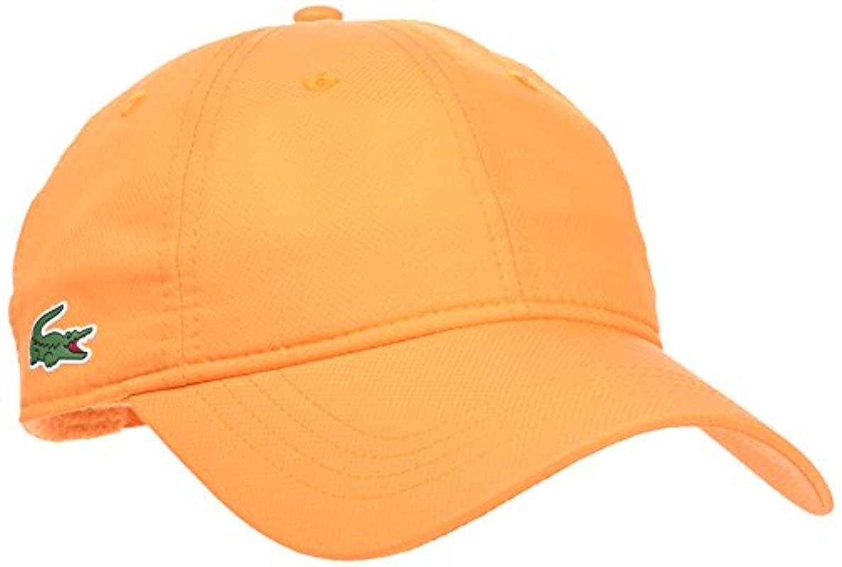 orange lacoste hat