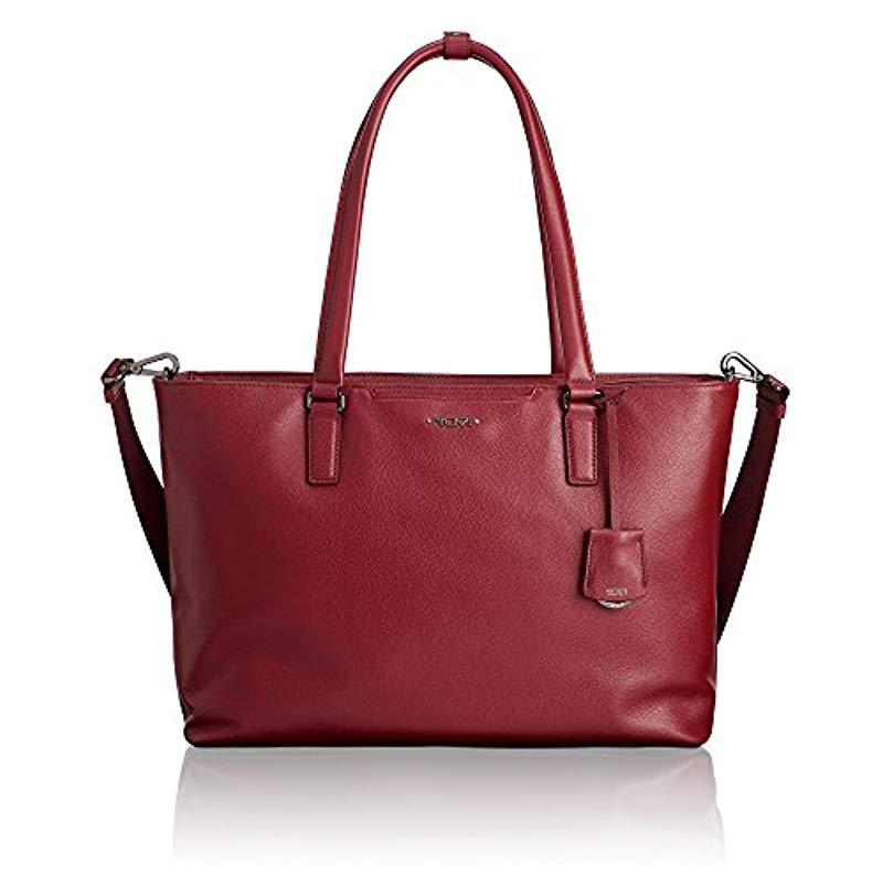 tumi leather handbag