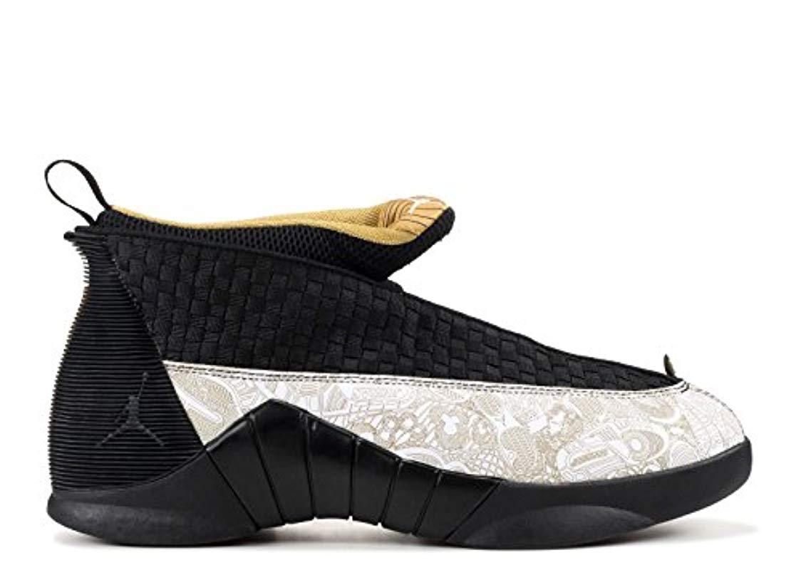 jordan retro 15 black and gold