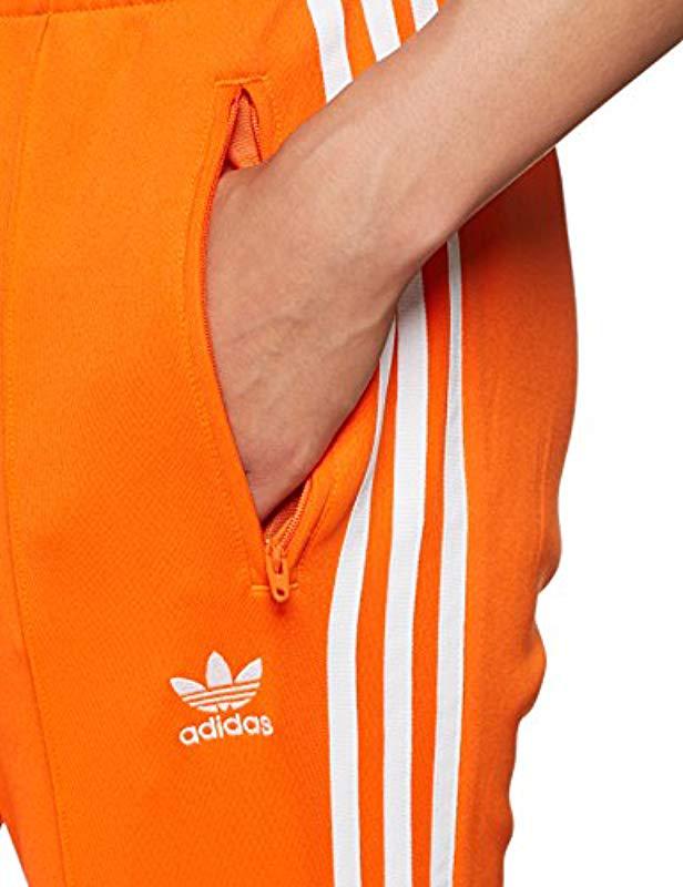 SST TP - Pantalon - Femme Synthétique adidas en coloris Orange - Lyst