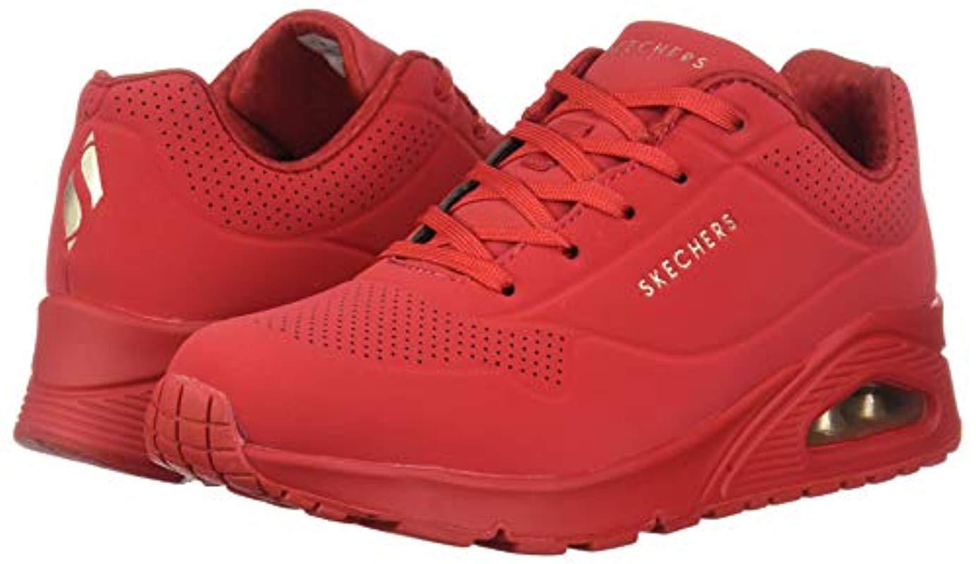 red skechers trainers