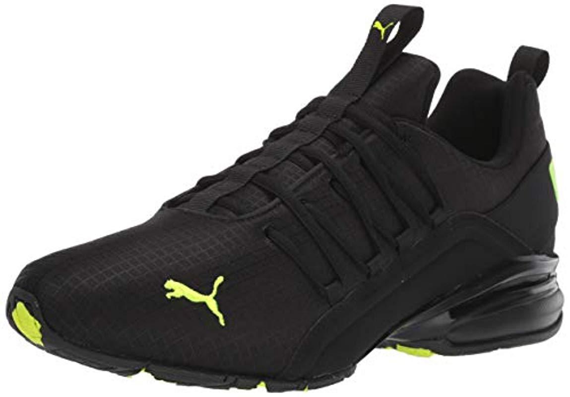 PUMA Axelion Sneaker, Black-yellow Alert, 10 M Us for Men | Lyst