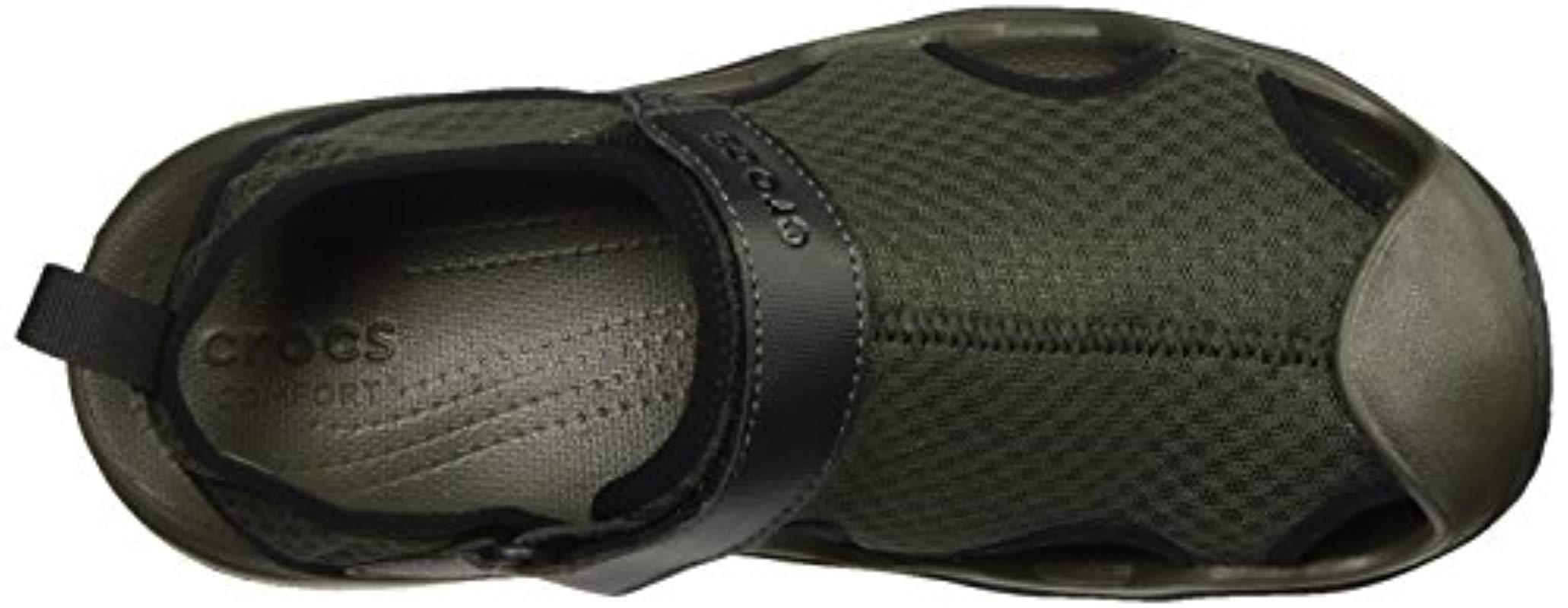 dark green crocs
