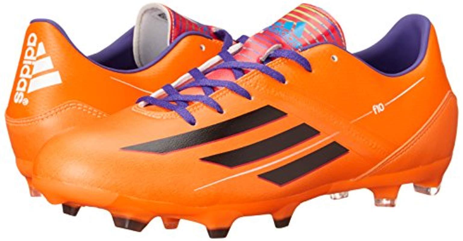 orange soccer boots