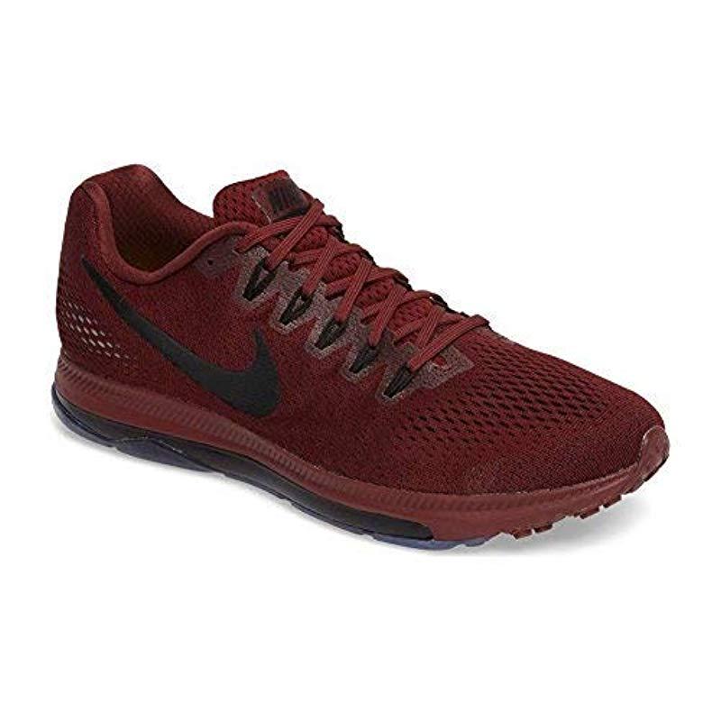 nike red and black running shoes