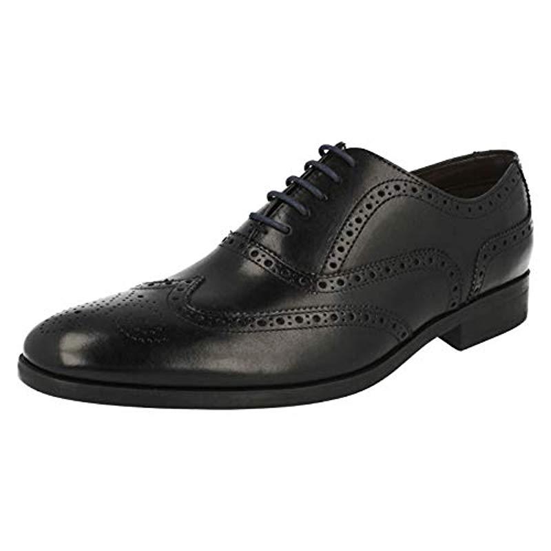 clarks black brogues