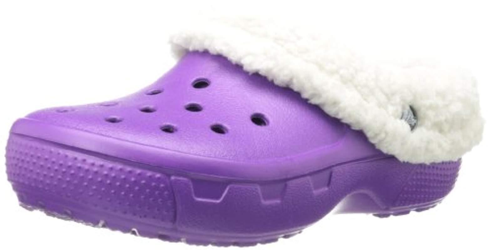 purple crocs with fur