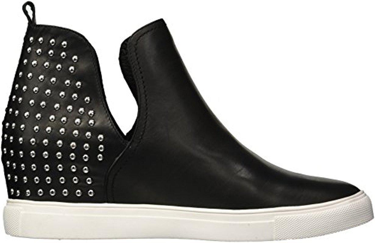 steven by steve madden coin leather and stud wedge sneakers