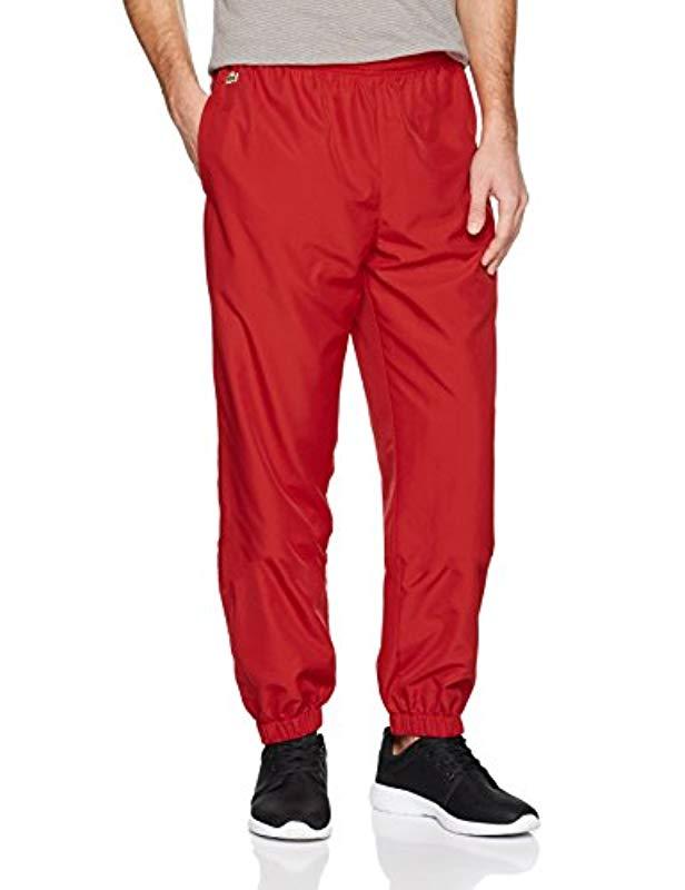 red lacoste trousers