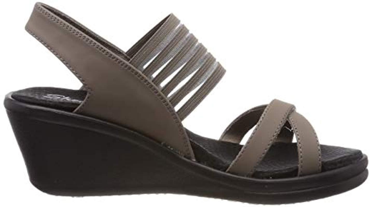 Skechers rumblers dorados