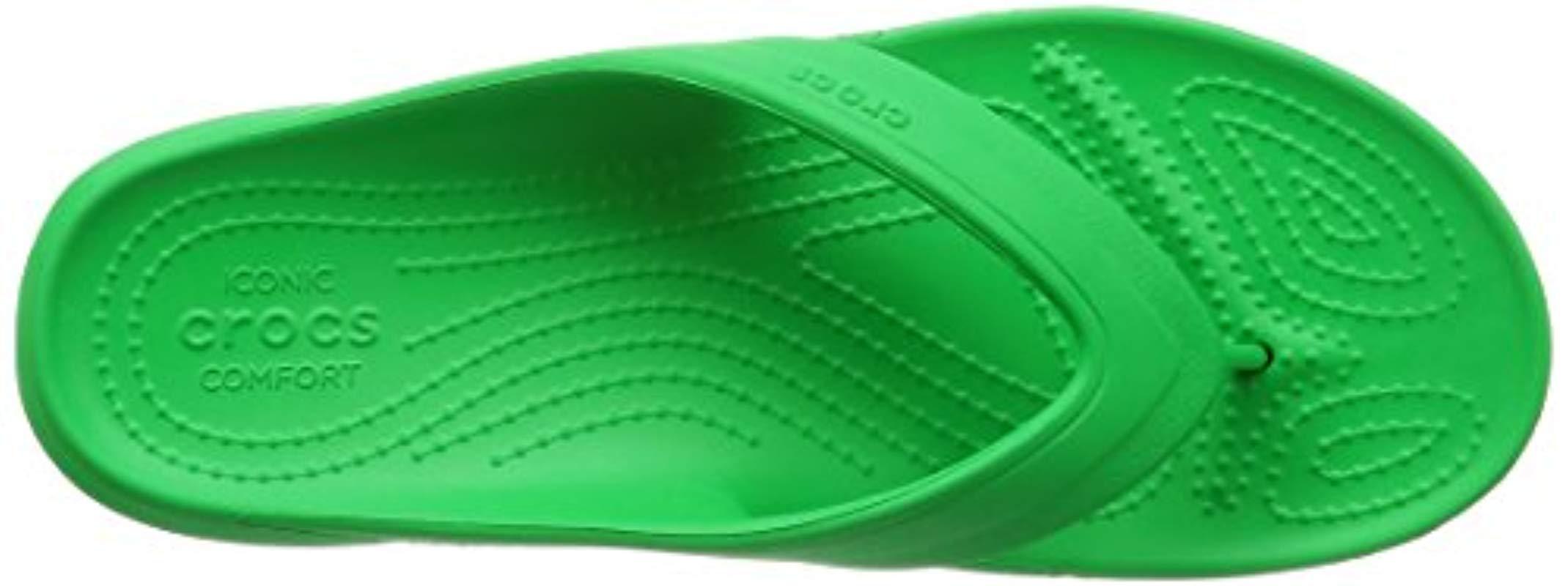 green croc flip flops