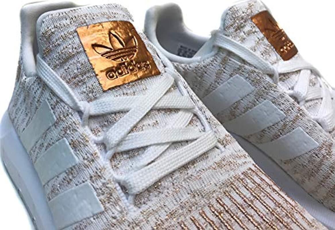 adidas swift run copper metallic