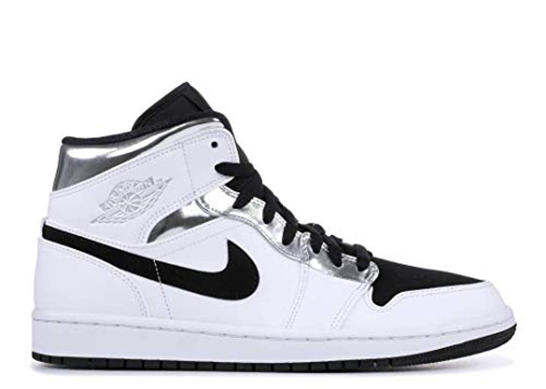 silver and black jordan 1