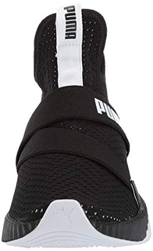 PUMA Defy Mid Core Shoes in Black | Lyst