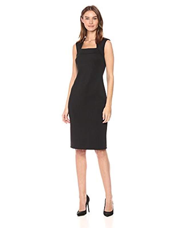 dark green knee length dress
