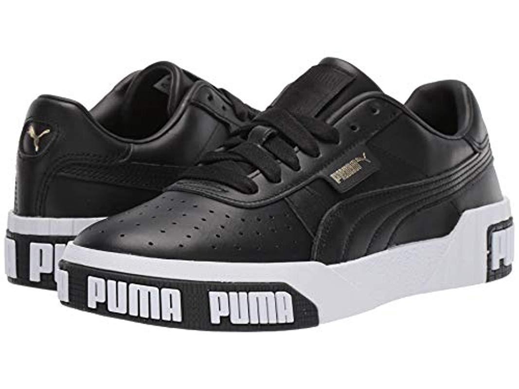 puma sneakers black and gold