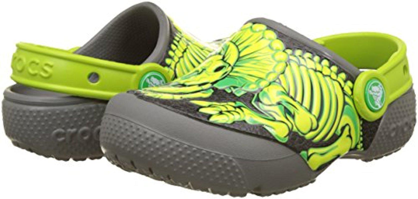 dinosaur crocs shoes