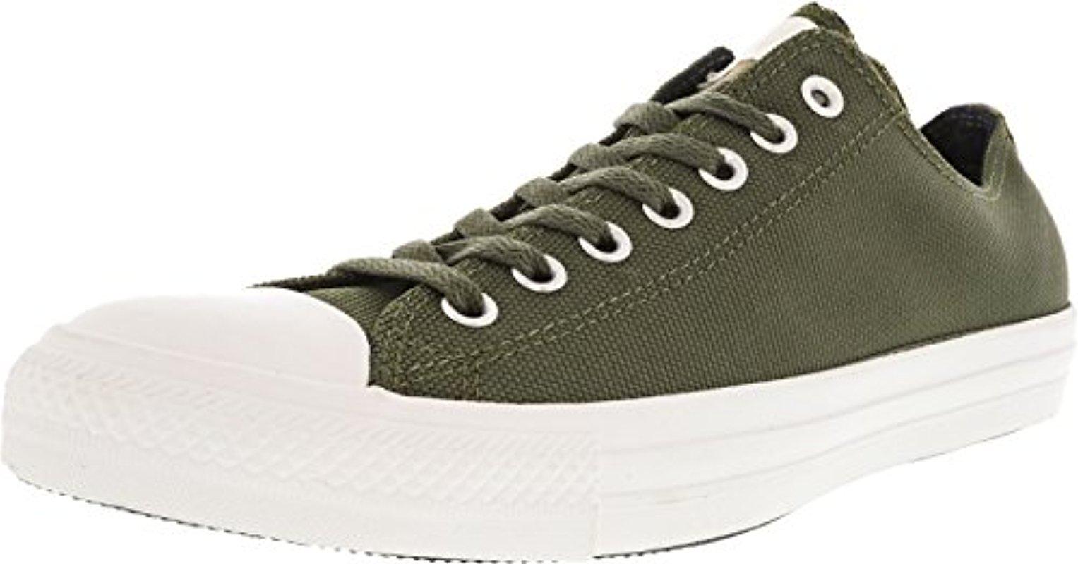 army green chuck taylors
