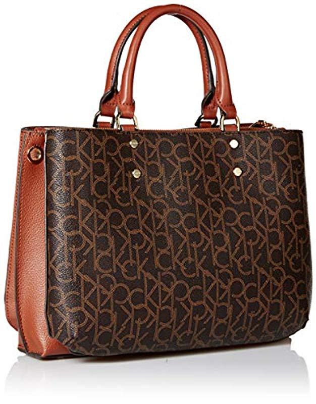Calvin Klein Dani Monogram Triple Compartment Satchel in Brown Lyst